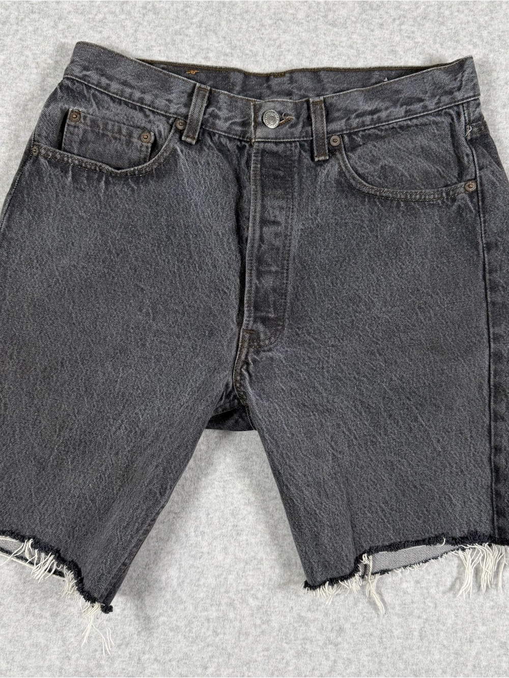 Levi's Washed Black Denim Cutoff Shorts